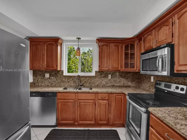 3-bedroom home for rent in Surfside - 8851 Byron Ave - MondialRealty