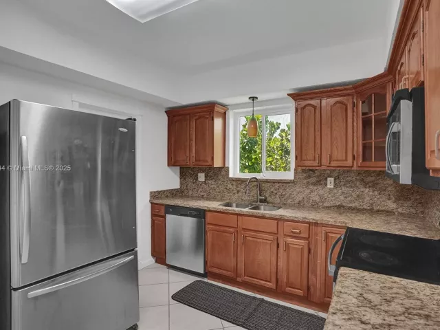 3-bedroom home for rent in Surfside - 8851 Byron Ave - MondialRealty