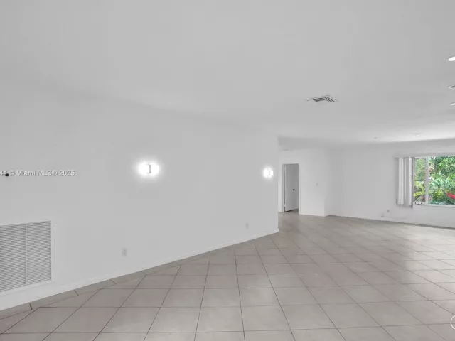 3-bedroom home for rent in Surfside - 8851 Byron Ave - MondialRealty