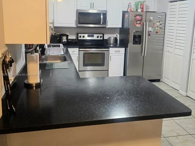 3-bedroom home for sale in Pembroke Pines - 10830 NW 8th St - MondialRealty