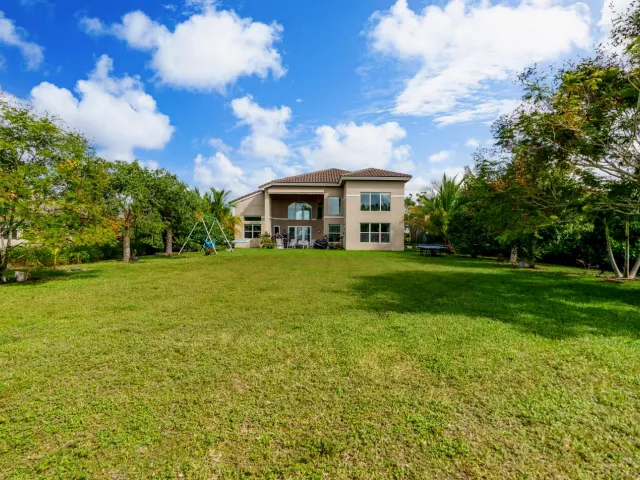 5-bedroom home for sale in West Palm Beach - 7797 Maywood Crest Drive - MondialRealty