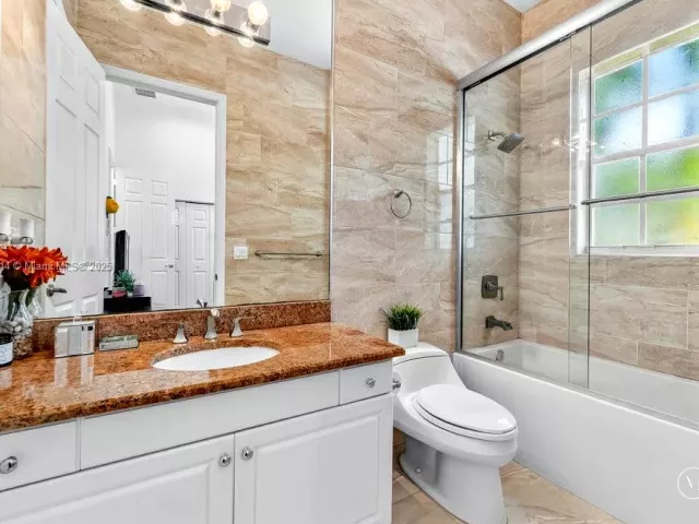 4-bedroom home for rent in West Palm Beach - 6313 Paradise Cv - MondialRealty