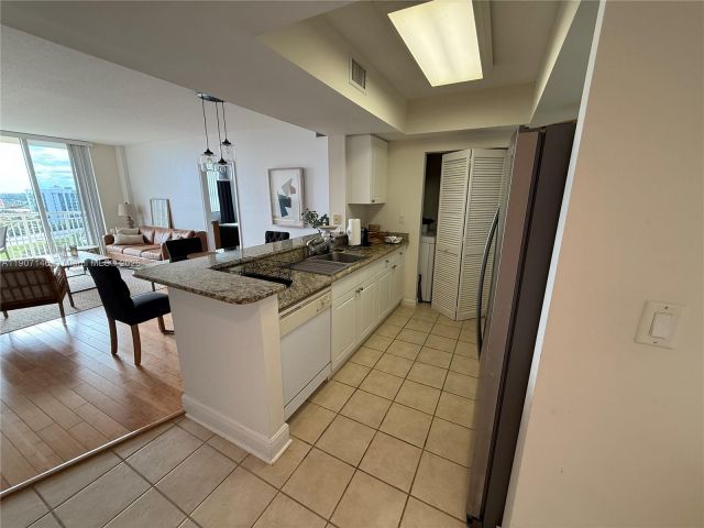 2-bedroom condo for rent in Aventura - 19501 W Country Club Dr 1405 - MondialRealty