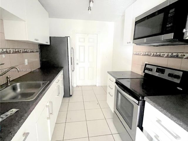 3-bedroom home for rent in Miami Gardens - 18240 NW 41st Pl 2 - MondialRealty