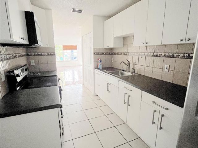 3-bedroom home for rent in Miami Gardens - 18240 NW 41st Pl 2 - MondialRealty