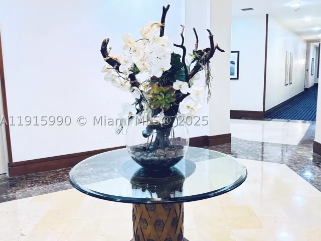 1-bedroom condo for sale in Aventura - 19501 W Country Club Dr PH-06 - MondialRealty