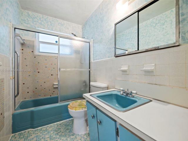 Home for sale at 700 NE 118th St - photo 6810431