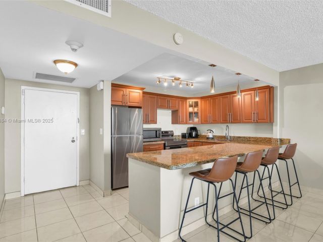 1-bedroom condo for sale in Hallandale Beach - 2500 Parkview Dr 2411 - MondialRealty