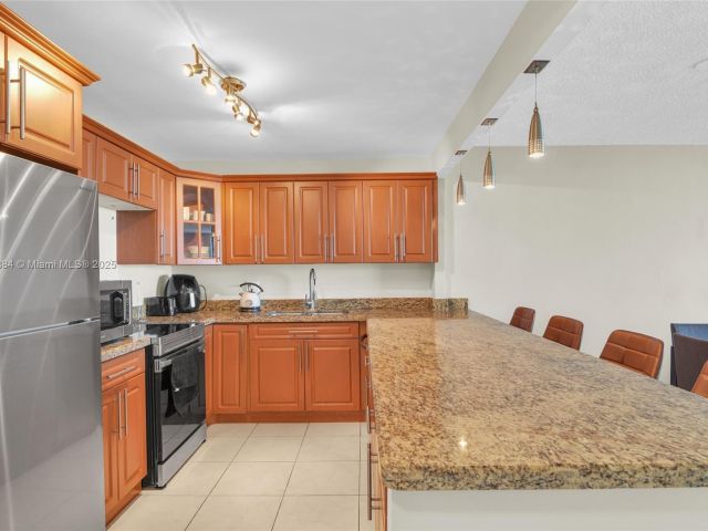 1-bedroom condo for sale in Hallandale Beach - 2500 Parkview Dr 2411 - MondialRealty