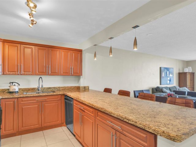 1-bedroom condo for sale in Hallandale Beach - 2500 Parkview Dr 2411 - MondialRealty