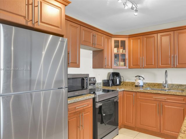 1-bedroom condo for sale in Hallandale Beach - 2500 Parkview Dr 2411 - MondialRealty