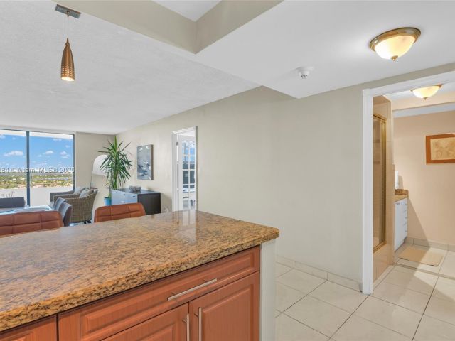 1-bedroom condo for sale in Hallandale Beach - 2500 Parkview Dr 2411 - MondialRealty