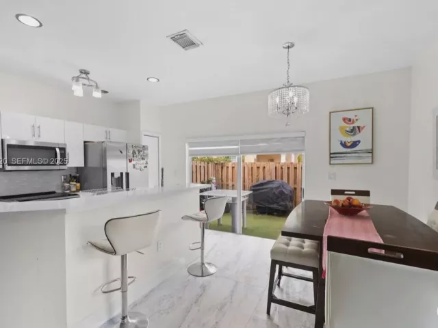 3-bedroom home for sale in Doral - 8362 NW 107th Ct 7-24 - MondialRealty