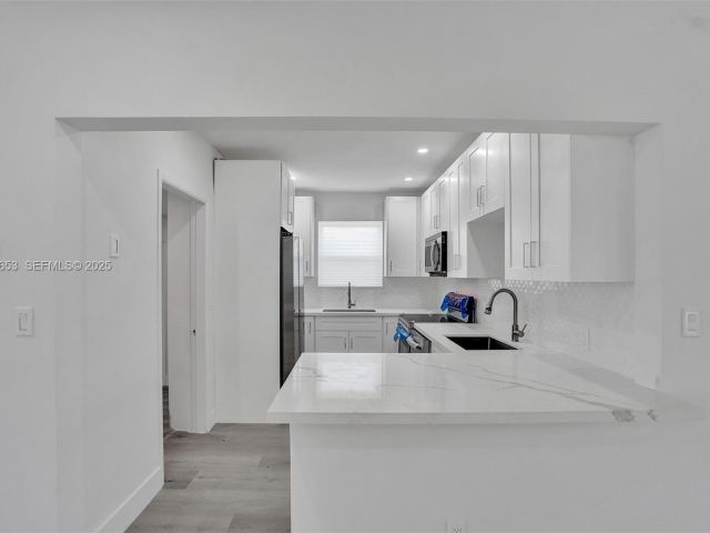 Home for sale at 1041 NE 169th St - photo 7445687