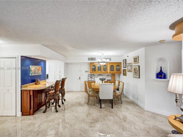 2-bedroom condo for sale in Aventura - 3600 Mystic Pointe Dr 311 - MondialRealty