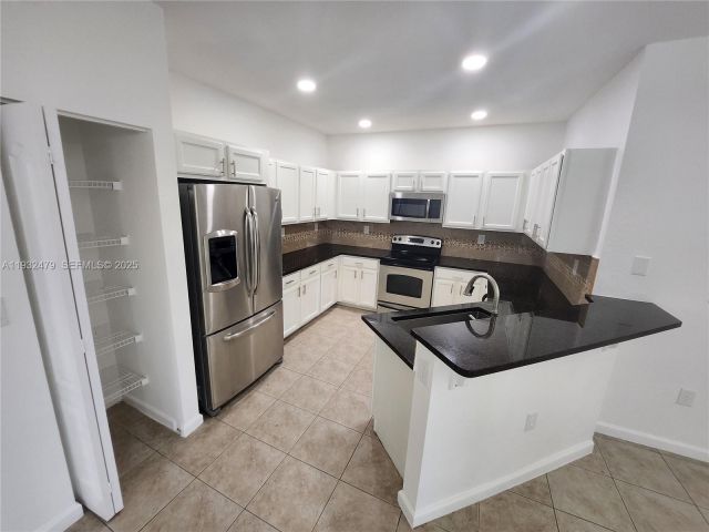 4-bedroom home for rent in Homestead - 13973 SW 276th Way - MondialRealty