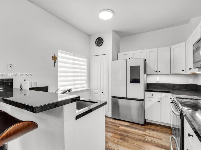 Home for sale at 12661 SW 143rd Ln 12661 - photo 7522599