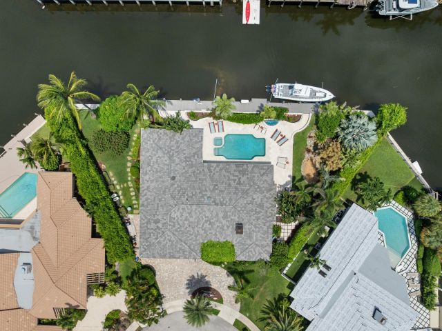 Home for sale at 830 NE Boca Bay Colony Drive - photo 6934962