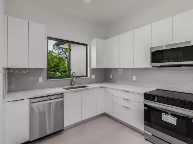 4-bedroom home for sale in Biscayne Park - 1030 NE 121st St - MondialRealty