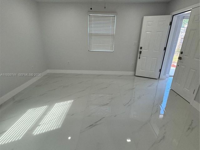 Home for sale at 1649 NE 30th Ct - photo 6997670