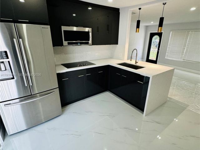 Home for sale at 1649 NE 30th Ct - photo 6997677