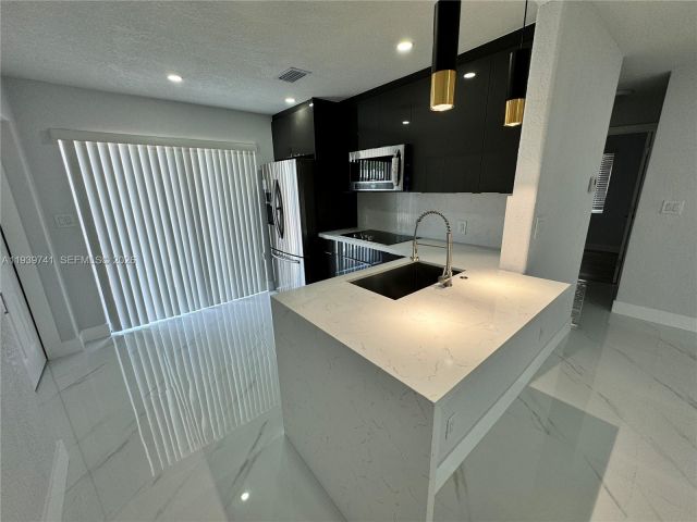 Home for sale at 1649 NE 30th Ct - photo 6997679