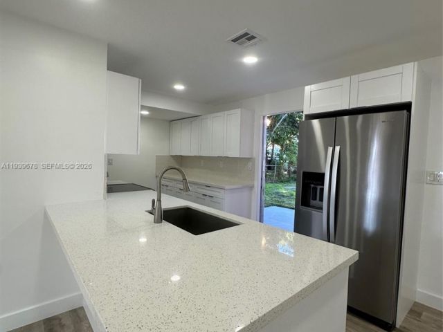 Home for sale at 1521 NE 43rd Ct - photo 6997614