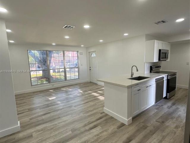 Home for sale at 1521 NE 43rd Ct - photo 6997616