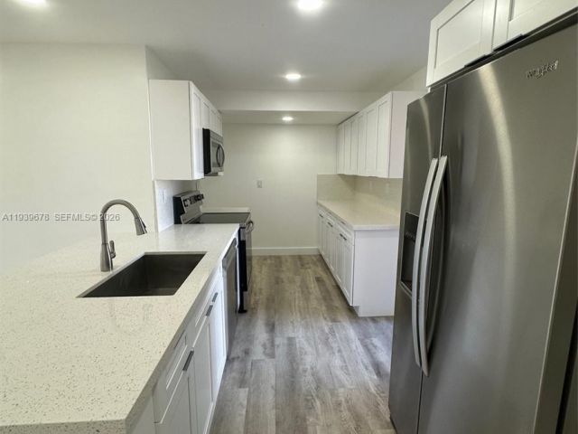 Home for sale at 1521 NE 43rd Ct - photo 6997618