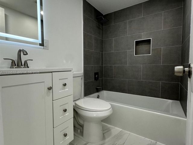 Home for sale at 1521 NE 43rd Ct - photo 6997620