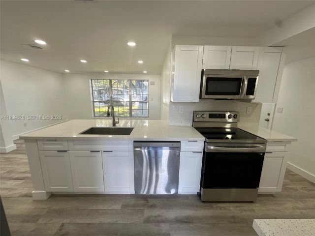 Home for sale at 1521 NE 43rd Ct - photo 6997637