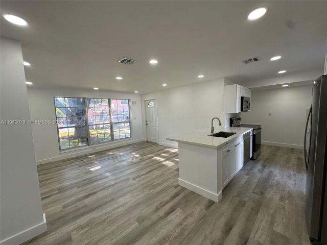 Home for sale at 1521 NE 43rd Ct - photo 6997639