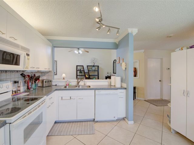 3-bedroom home for rent in Deerfield Beach - 1248 W Lakes Dr 1248 - MondialRealty