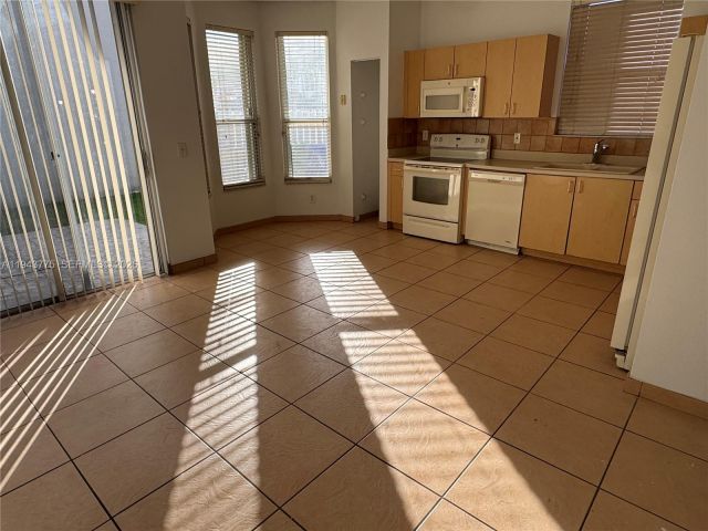 Home for rent at 13064 NW 9th Ct 13064 - photo 7454925