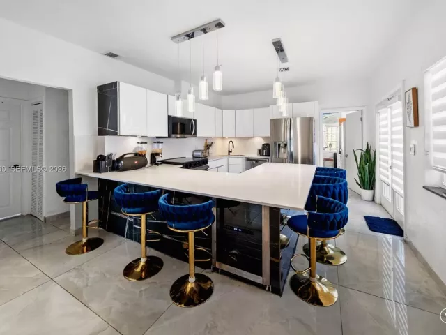 3-bedroom home for sale in Surfside - 8918 Harding Ave - MondialRealty