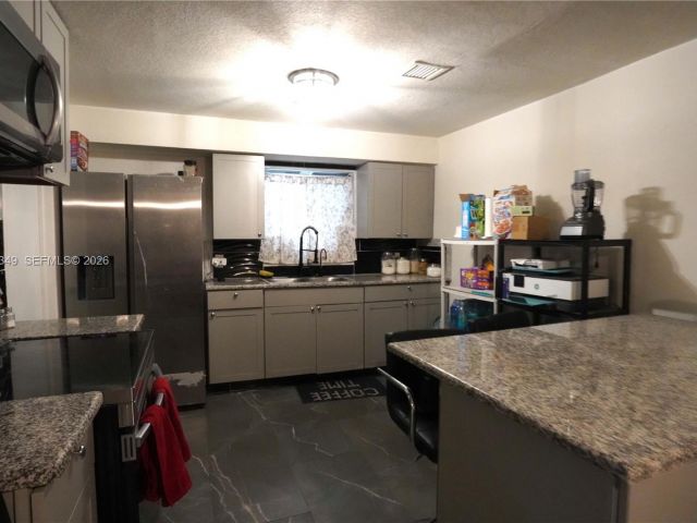 Home for sale at 625 NE 130th Street - photo 7437379