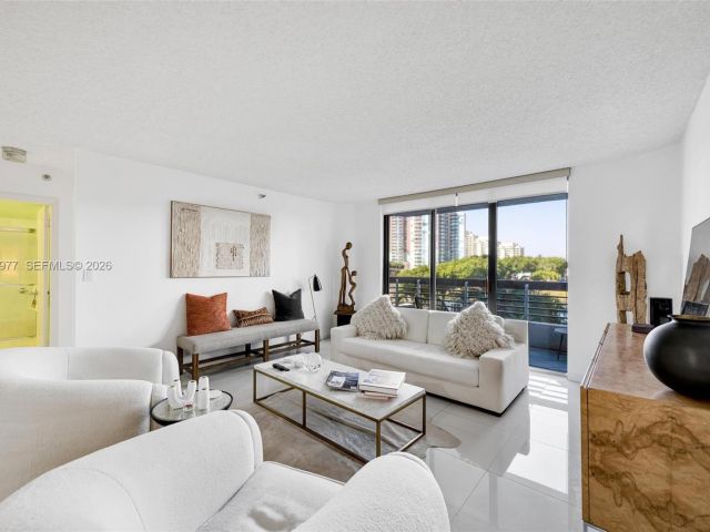 2-bedroom condo for sale in Aventura - 3530 Mystic Pointe Dr 303 - MondialRealty