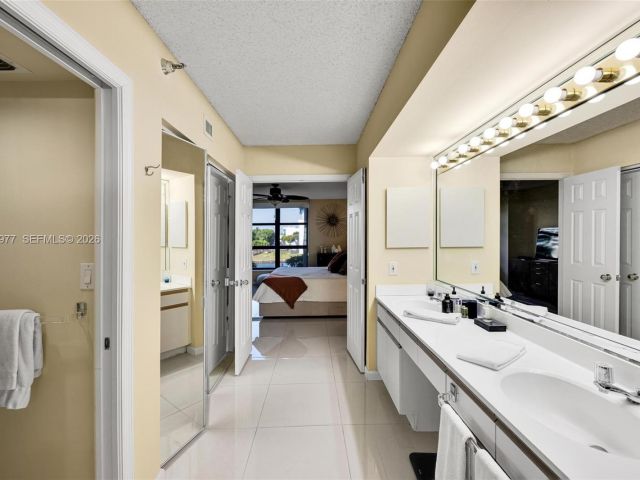 2-bedroom condo for sale in Aventura - 3530 Mystic Pointe Dr 303 - MondialRealty