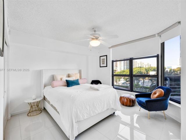 2-bedroom condo for sale in Aventura - 3530 Mystic Pointe Dr 303 - MondialRealty