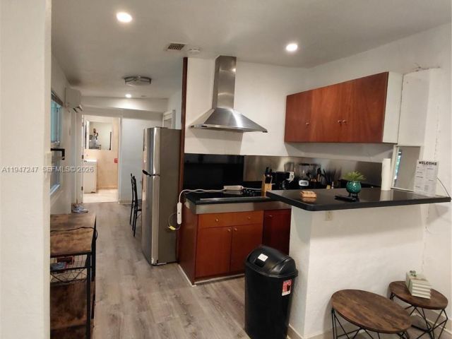 Home for rent at 1050 NE 82nd St 3 - photo 7515138