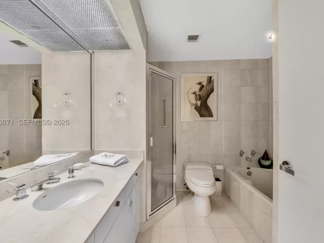 2-bedroom condo for sale in Bal Harbour - 10101 Collins Ave 11D +Cabana - MondialRealty