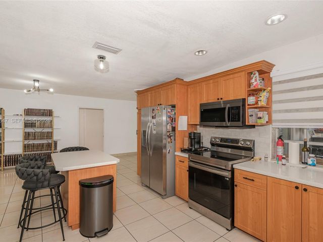 Home for sale at 8950 Harding Ave - photo 7288007