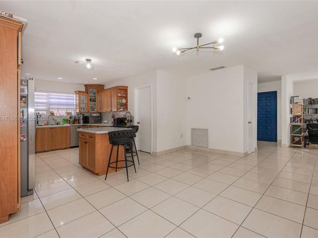 Home for sale at 8950 Harding Ave - photo 7288009