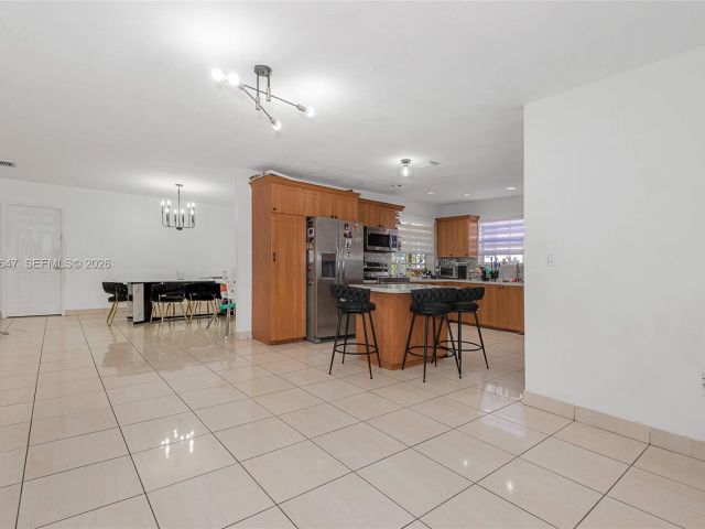 Home for sale at 8950 Harding Ave - photo 7288011