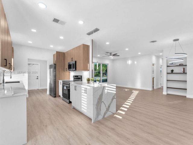 Home for sale at 2144 NE 61st Ct - photo 7482414