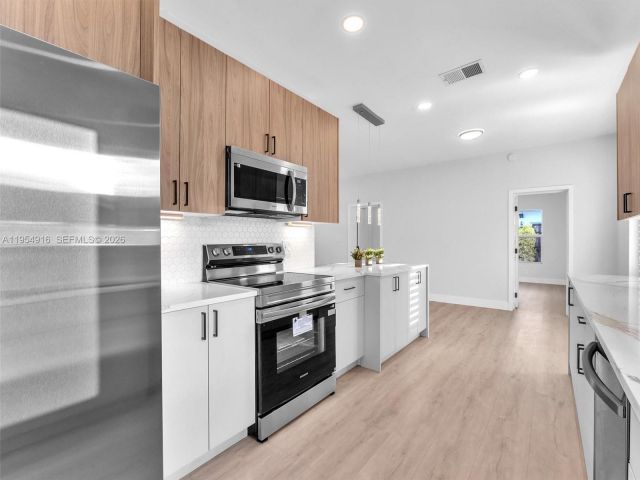 Home for sale at 2144 NE 61st Ct - photo 7482415