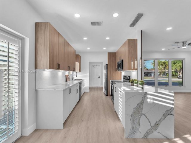 Home for sale at 2144 NE 61st Ct - photo 7482416