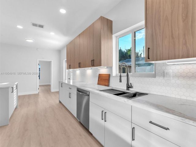 Home for sale at 2144 NE 61st Ct - photo 7482417