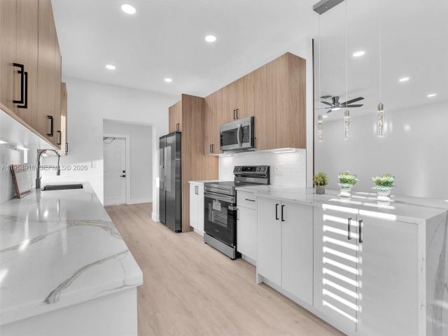 Home for sale at 2144 NE 61st Ct - photo 7482418