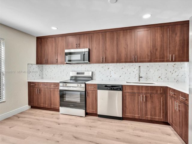 3-bedroom home for rent in Pembroke Pines - 1193 NW 98th Ter 134 - MondialRealty